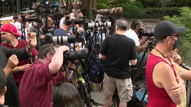 Photographing 'Manhattanhenge' is a contact sport