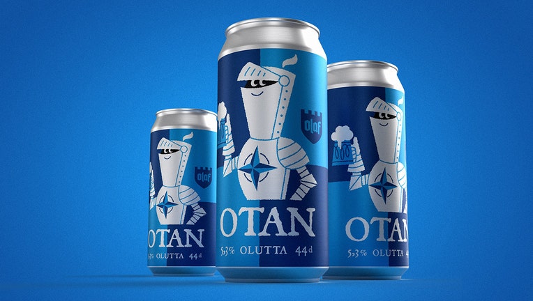 Three beer cans with the name OTAN and a knight design