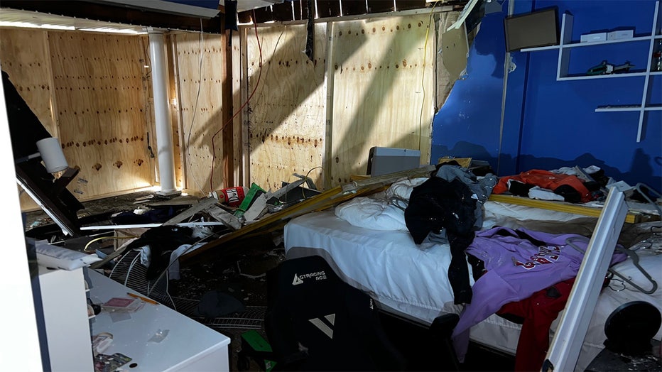 A photo shows the inside of the Long Island home that a truck crashed through. (Jodi Goldberg/FOX5NY)