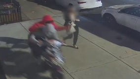 Robbers on moped rip purse from woman, drag her on sidewalk