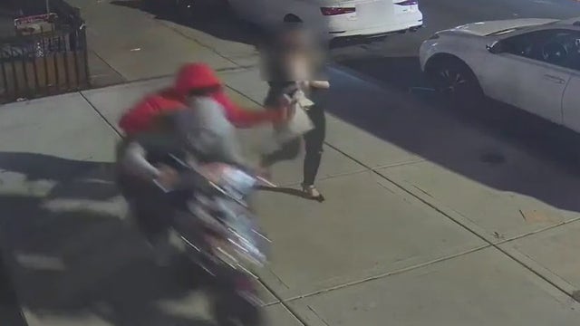 Robbers on moped rip purse from woman, drag her on sidewalk