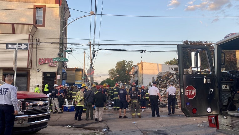 A firefighter died and another transported to the hospital after a building fire and collapse in Philadelphia.