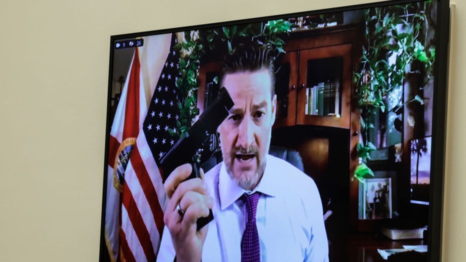 WASHINGTON, DC - JUNE 02: Rep. Greg Steube (R-FL) demonstrates assembling his handgun as he speaks remotely during a House Judiciary Committee mark up hearing in the Rayburn House Office Building on June 02, 2022 in Washington, DC.