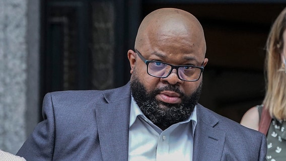 R. Kelly adviser pleads guilty to stalking