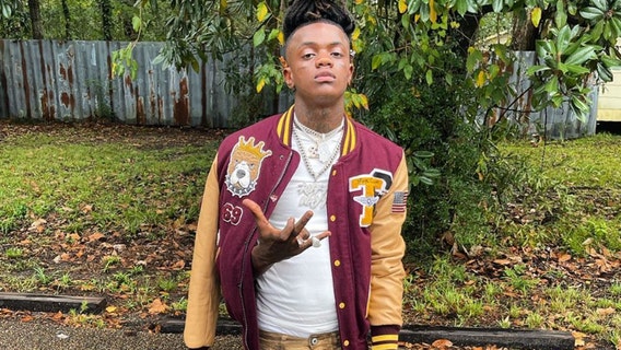 Rapper shot to death outside home