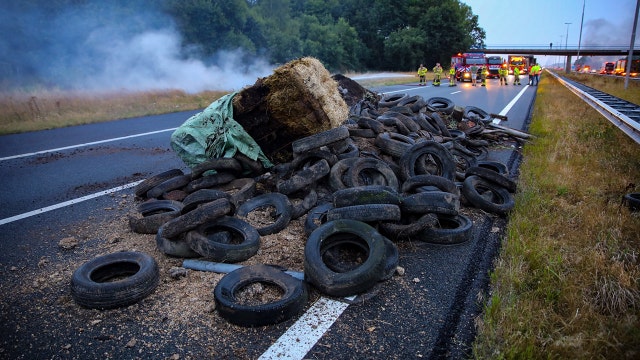 Protesting Dutch farmers dump manure, garbage on roads