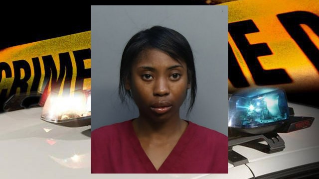 Woman charged with killing woman in back seat of Uber