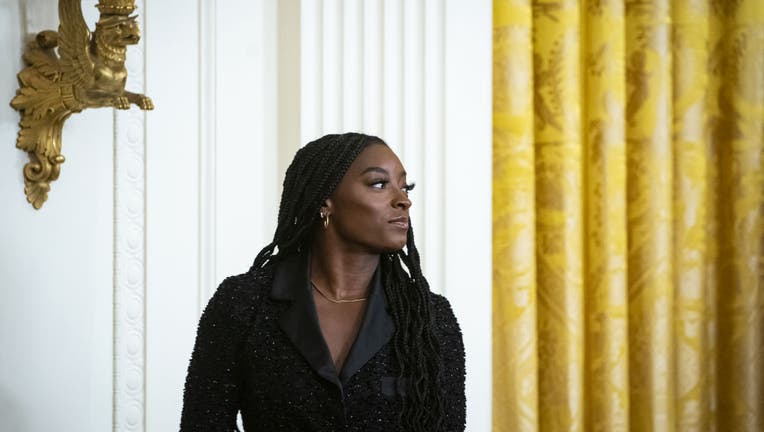 Simone Biles, Olympic gymnast, during a Presidential Medal of Freedom ceremony with US President Joe Biden, not pictured, in the East Room of the White House in Washington, D.C., US, on Thursday, July 7, 2022.