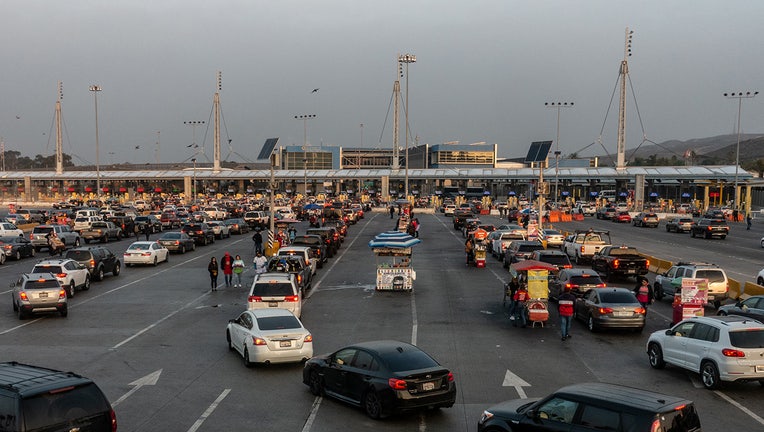 Vehicles wait to cross the San Ysidro Port of Entry in Tijuana, Mexico, on Monday, Nov. 8, 2021. (Cesar Rodriguez/Bloomberg via Getty Images)