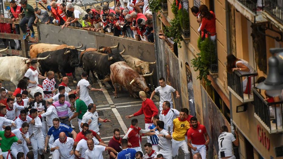 Thousands take part in first running of the bulls in Spain's San Fermin  festival
