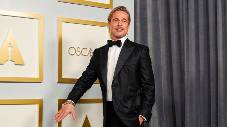 LOS ANGELES, CALIFORNIA - APRIL 25: Brad Pitt poses in the press room at the Oscars on Sunday, April 25, 2021, at Union Station in Los Angeles.