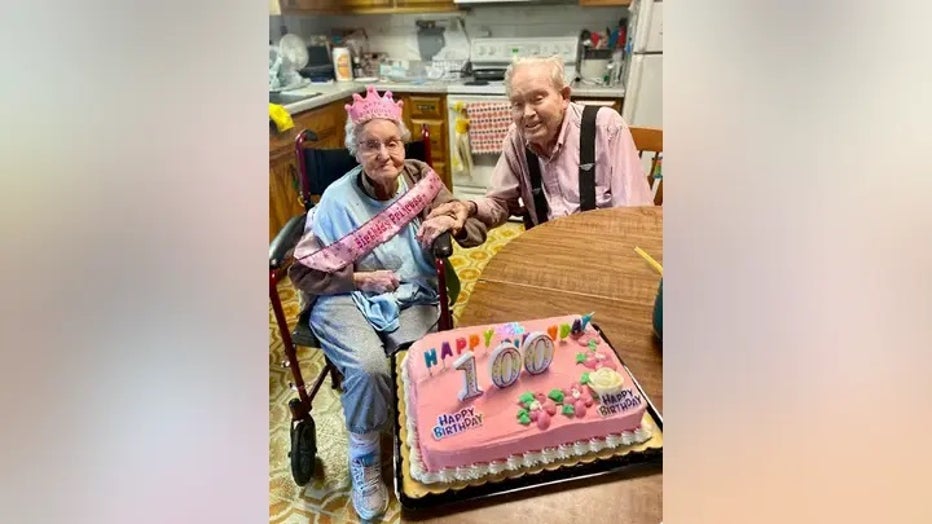 June-and-Hubert-Malicote-with-100th-Birthday-Cake.jpg