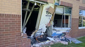 Car crashes into building, shortly after new owners finalize purchase