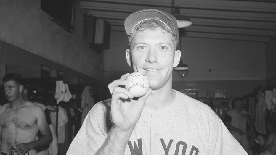 Mantle Holds Ball From 1000th Hit