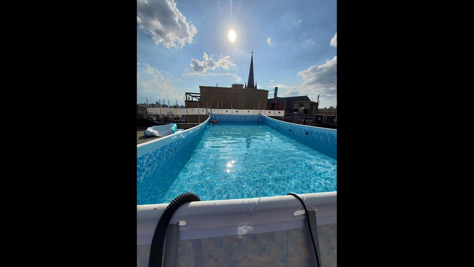 A photo shows the pool found on the roof of a NYC building. (NYC Building Dept.)