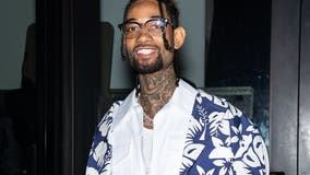 Father, son charged with murder of rapper PnB Rock