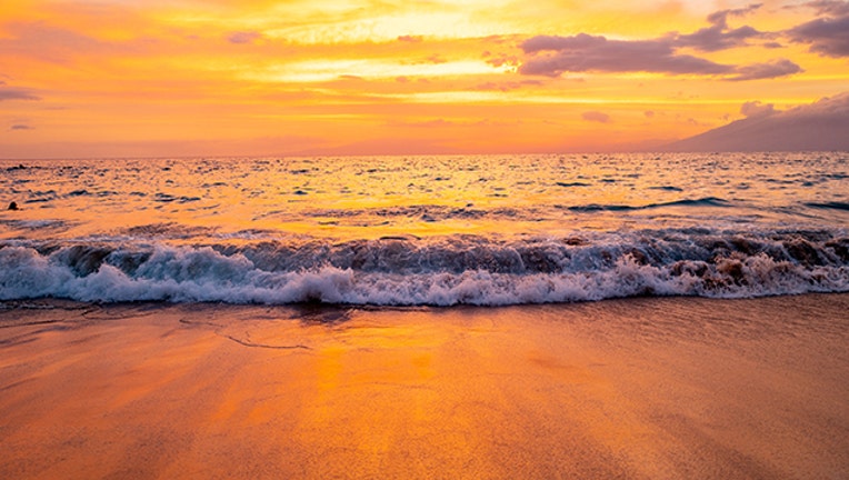 A colorful sunset is visible above Wailea Beach on the island of Maui, Kihei, Hawaii, July 30, 2022. Photo courtesy Sftm. (Photo by Gado/Getty Images)