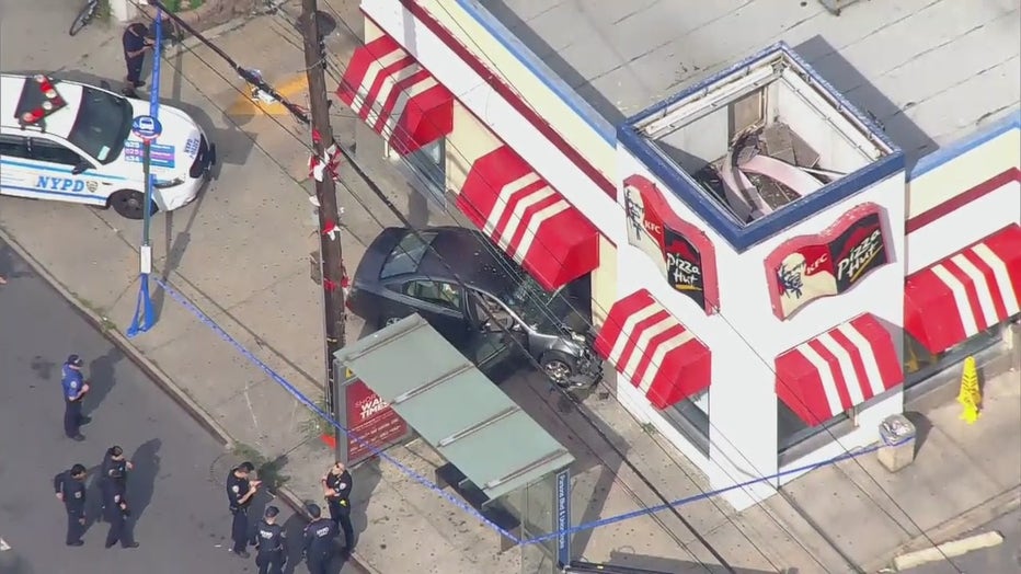 A car crashed into a KFC in Queens on Monday afternoon.