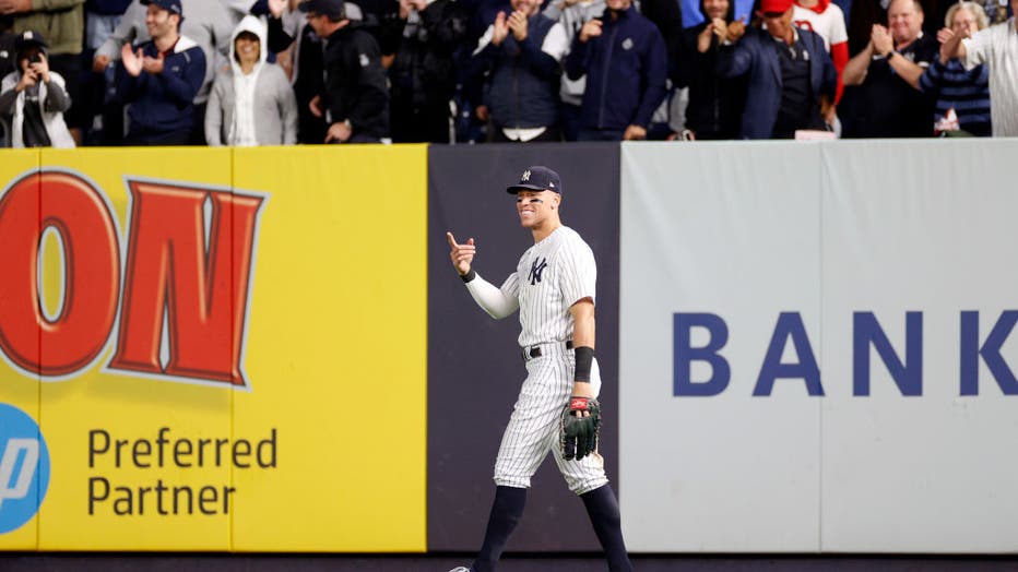 Aaron Judge falls just short of 61, Yankees clinch playoff berth in win  over Red Sox
