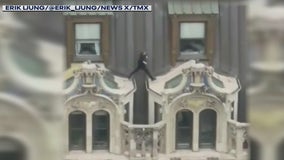 Video:  Mystery NYC rooftop jumper hops between awnings of building