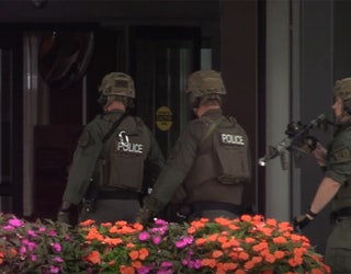 Police in Poughkeepsie say a man was shot to death early Sunday in a hotel.