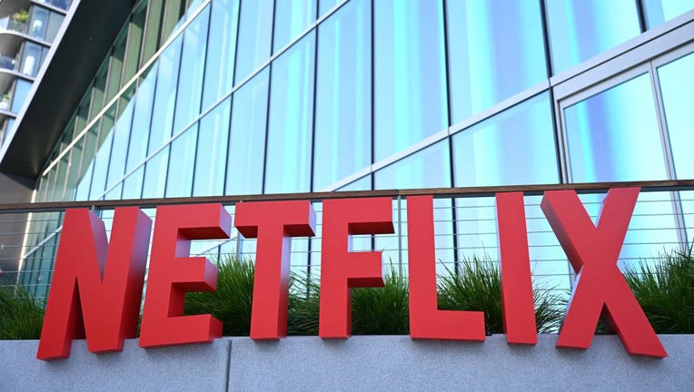 FILE - Netflix logo is seen on the side of the Netflix Tudum Theater in Los Angeles, California, on Sept. 14, 2022. (Photo by PATRICK T. FALLON/AFP via Getty Images)