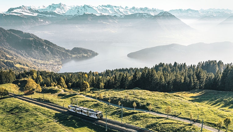 Rigi Railways’ cogwheel trains present dazzling views of Lake Lucerne as they ascend Mount Rigi, known as the