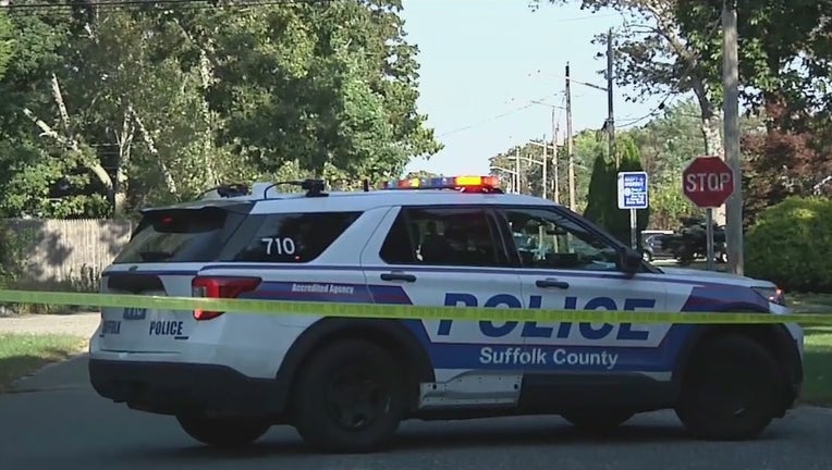 A Suffolk County Police vehicle is parked near Rep. Lee Zeldin's home after two teenagers were shot in the neighborhood.