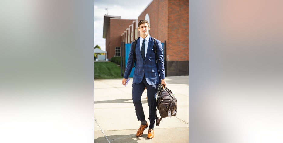 A tailor-made draft pick: Stylish N.J. suit-maker celebrated when