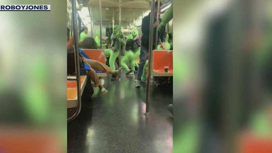 The NYPD is investigating a bizarre subway attack and robbery involving a group of women wearing tight full-body neon green leotards.