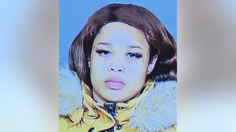 Closeup photo of a woman wanted in connection with a robbery