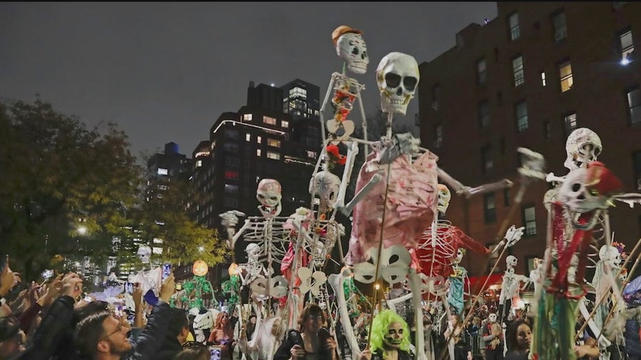 Skeleton puppets in the Village Halloween Parade.