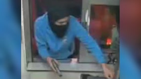 Watch: Armed robber grabs cash register from McDonald's drive-thru