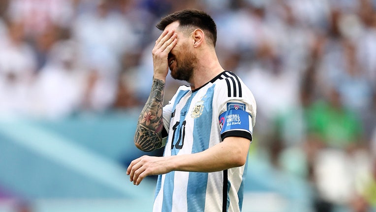 A dejected Lionel Messi of Argentina reacts during the FIFA World Cup Qatar 2022 Group C match between Argentina and Saudi Arabia at Lusail Stadium on November 22, 2022 in Lusail City, Qatar. (Photo by James Williamson - AMA/Getty Images)