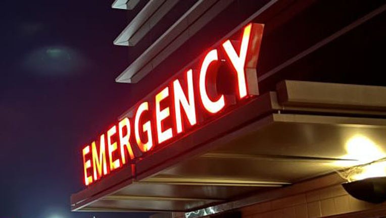 FILE - Night view of an illuminated red sign for the Emergency Department at a hospital in Walnut Creek, California on March 15, 2022. (Photo by Gado/Getty Images)
