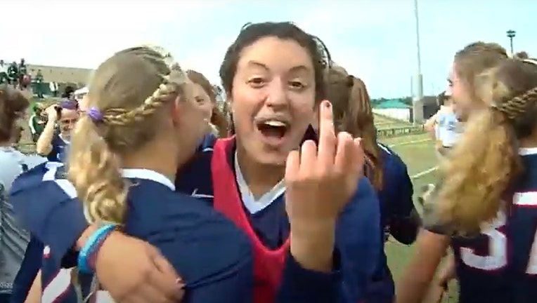 A screen grab from an ESPN broadcast shows Noriana Radwan showing her middle finger to the camera. (ESPN via ACLU)
