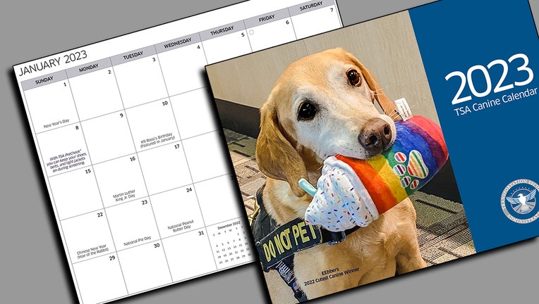 Calendar sheet showing January 2023 and cover page showing a dog with a chew toy in its mouth