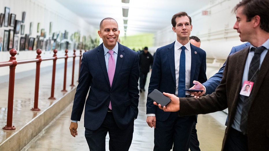 Democratic Caucus Chair Hakeem Jeffries, D-N.Y., center, and Rep. Jake Auchincloss, D-Mass., are seen in the Cannon tunnel during a vote on Wednesday, November 30, 2022. (Tom Williams/CQ-Roll Call, Inc via Getty Images)