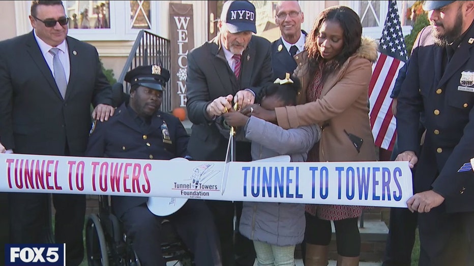 The Tunnel to Towers Foundation held a ribbon cutting with Detective Dalsh Veve and his wife, Esther, at their home in Baldwin, N.Y.
