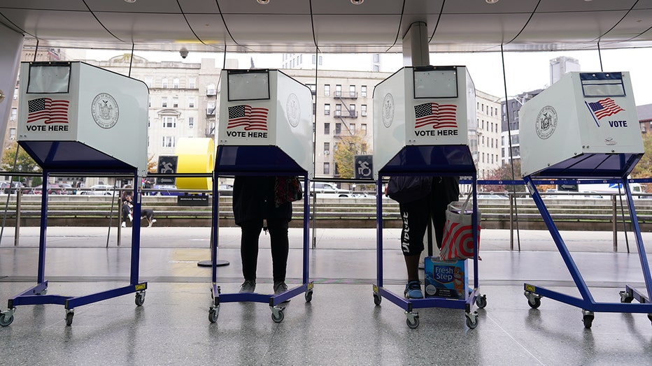 Voters cast their ballots at a polling place during early voting at the Brooklyn Museum in Brooklyn, New York City, USA, November 1, 2022. (Photo by Lokman Vural Elibol/Anadolu Agency via Getty Images)