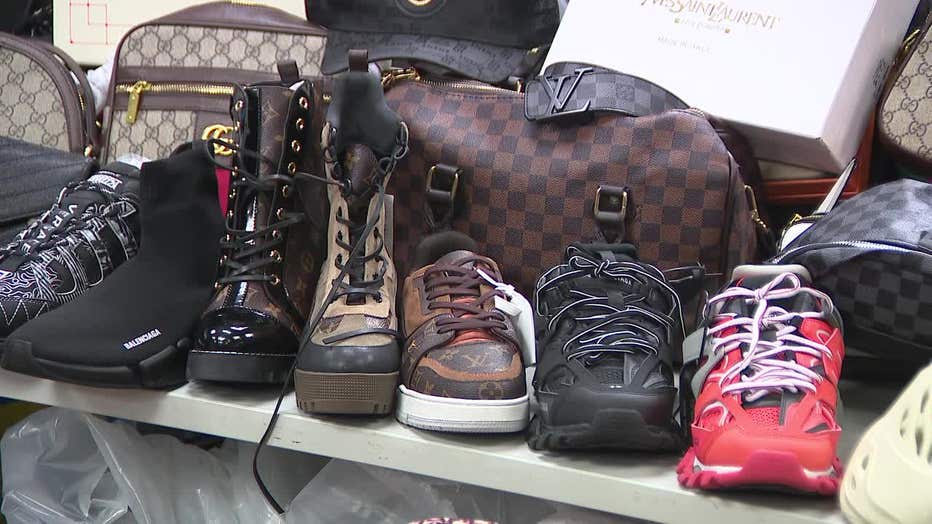 Counterfeit shoes were on display at an NYPD news conference.