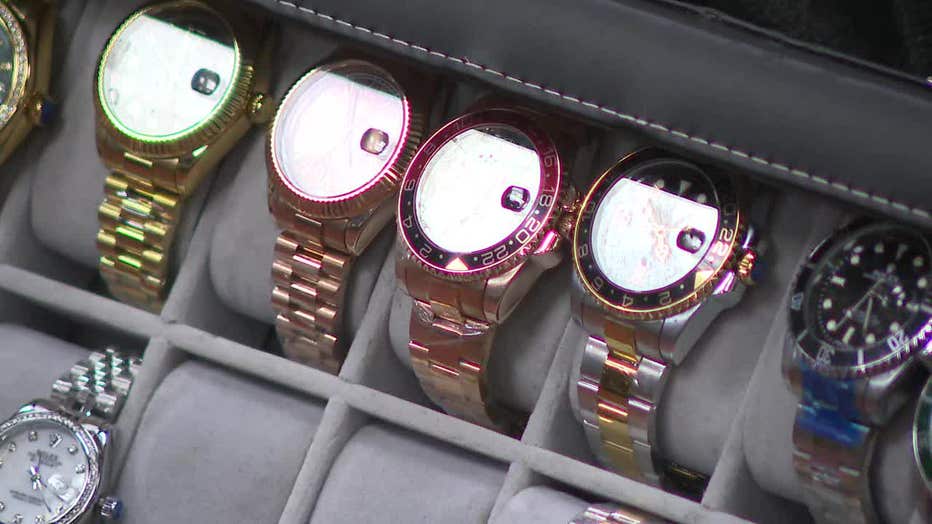 Counterfeit watches were on display at an NYPD news conference.