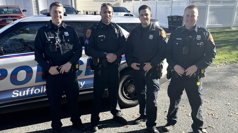 Four Suffolk County Police Officers who helped a woman safely deliver a baby in Shirley pose for a photo. (Suffolk County Police)