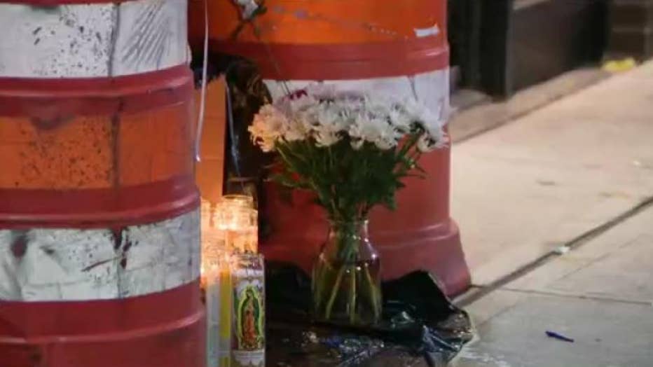 A memorial sits outside a Bronx building where two young brothers were allegedly killed by their mother.