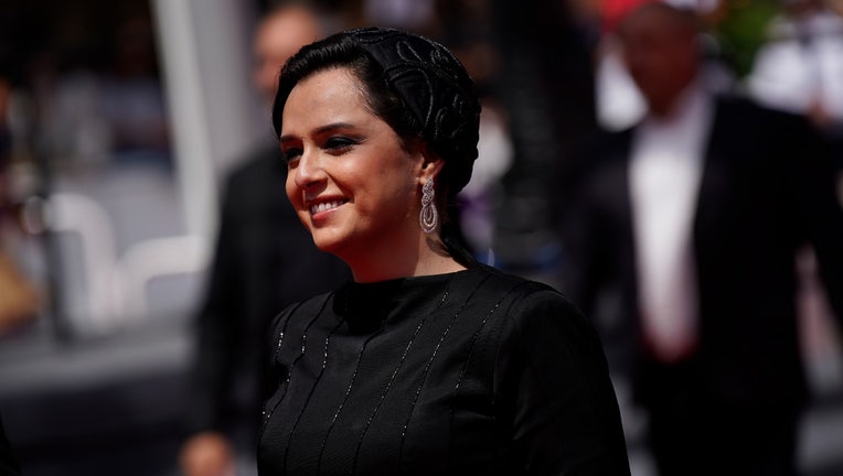 FILE - Taraneh Alidoosti poses for photographers upon arrival at the premiere of the film 'Leila's Brothers' at the 75th international film festival, Cannes, southern France, Wednesday, May 25, 2022. Iranian authorities arrested Alidoosti, one of the country’s most famous actresses on charges of spreading falsehoods about nationwide protests that grip the country, state media said Saturday, Dec. 17. (AP Photo/Daniel Cole, File)