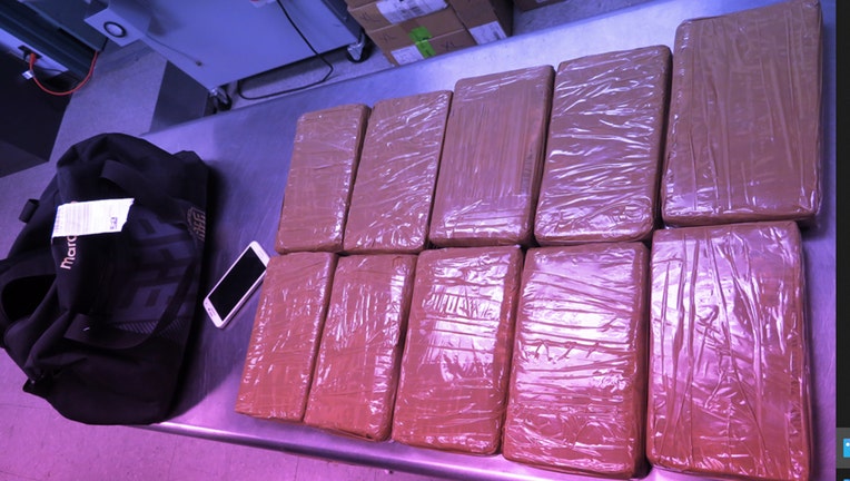 Cocaine that was seized at JFK airport is displayed. (CBP)