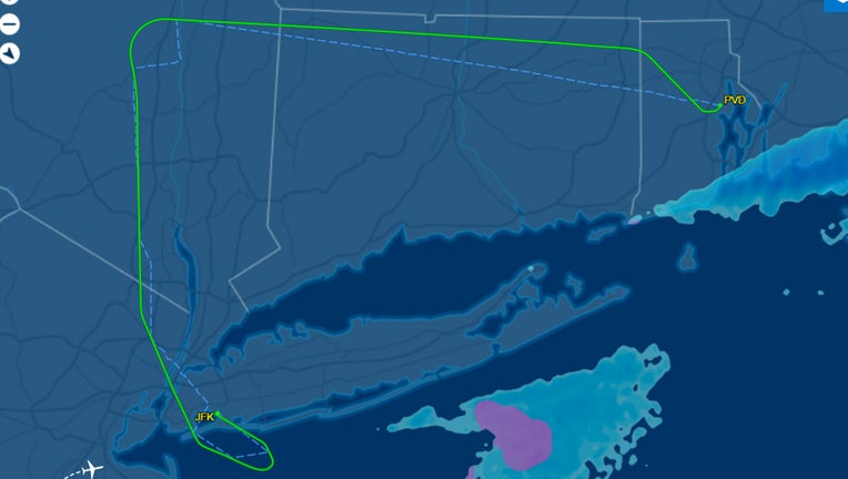 The flight tracking site Flight Aware showed the plane landed at JFK.