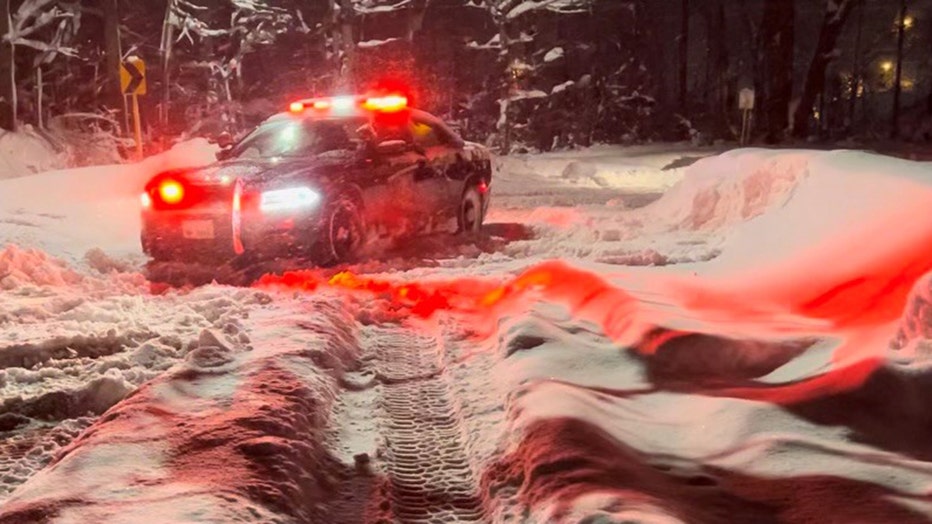 A New York State Police vehicle in the snow