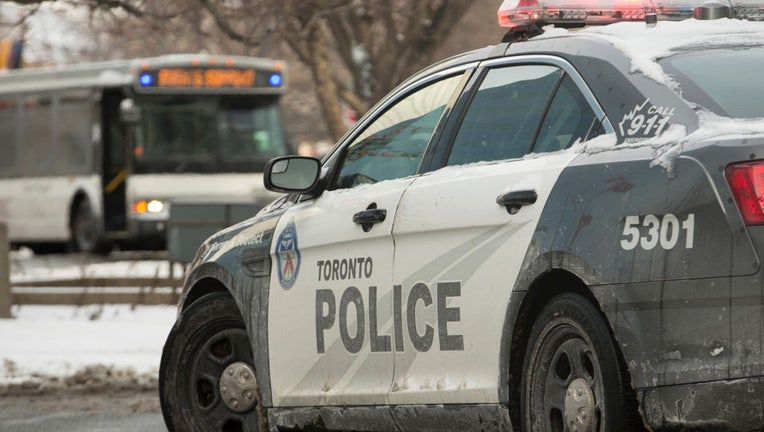 TORONTO, ON - FEBRUARY 4: TPS vehicles close of University Avenue just south of College Street. Toronto Police Services close off major arteries in the downtown core around Queens Park and hospital row, in advance of the protest planned for tomorrow by anti-mandate citizens. CORONAPD Toronto Star/Rick Madonik (Rick Madonik/Toronto Star via Getty Images)