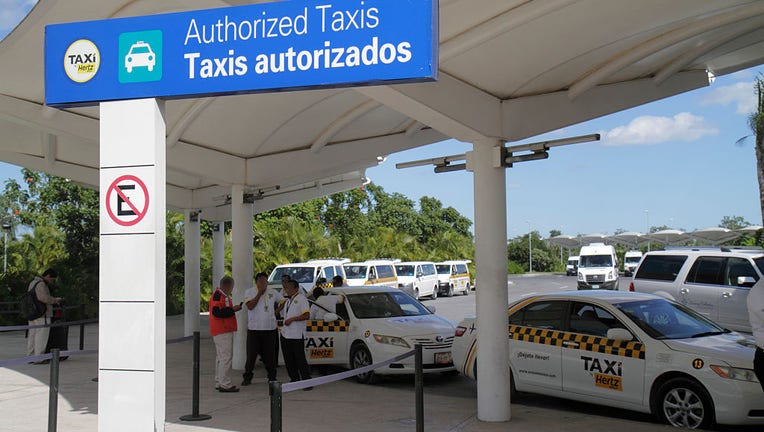 Mexico, Yucatan Peninsula, Quintana Roo, Cancun, Cancun International Airport, taxi sign . (Photo by: Jeffrey Greenberg/Universal Images Group via Getty Images)